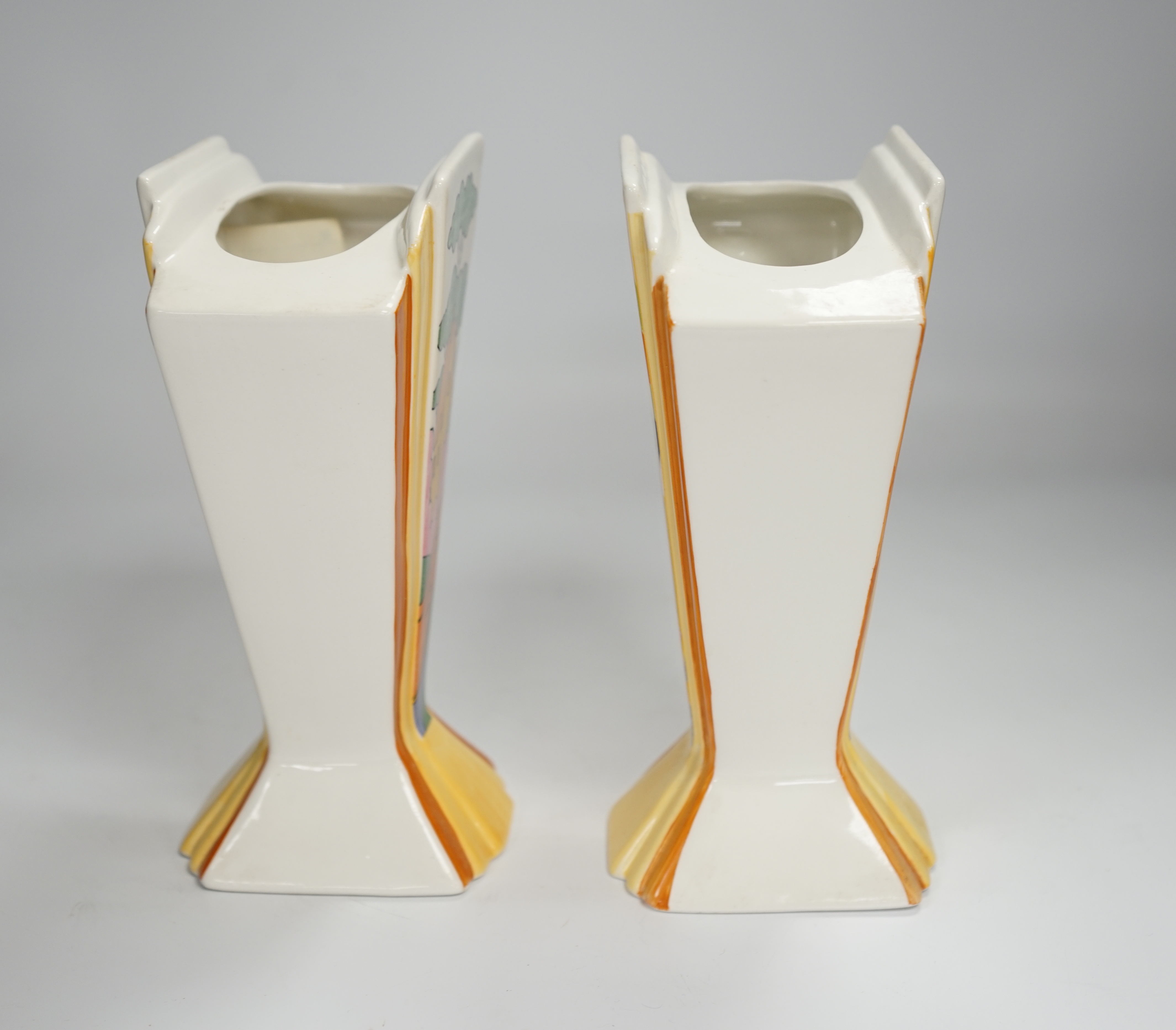 Two modern copies of Clarice Cliff Sunray vases; Caravan and Orange Roof Cottage, 21cm